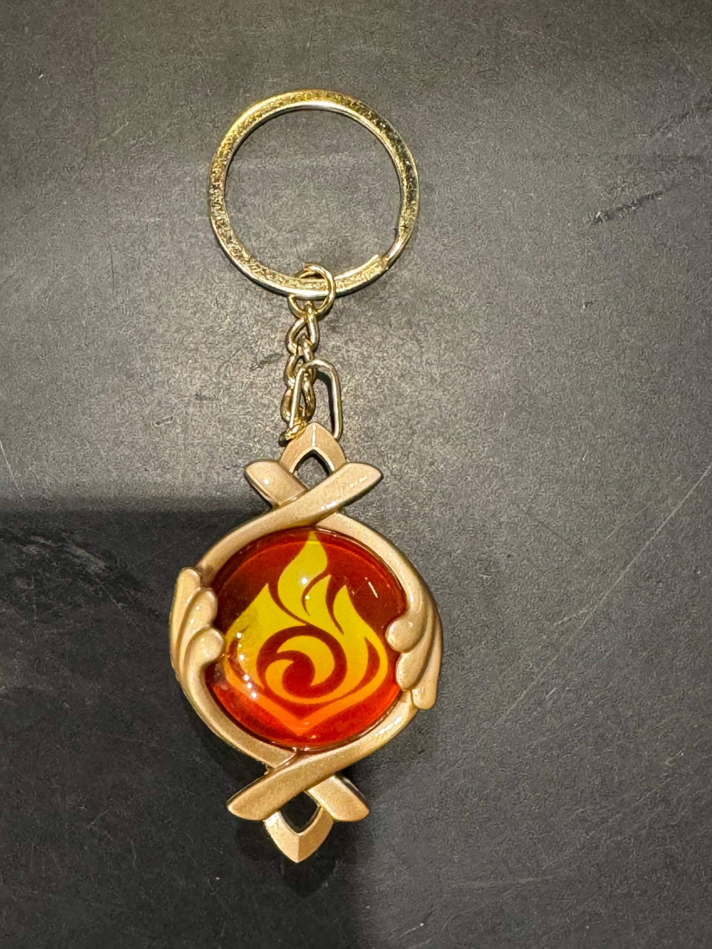 Genshin Impact - Pyro Fontaine Vision Metal Keychain