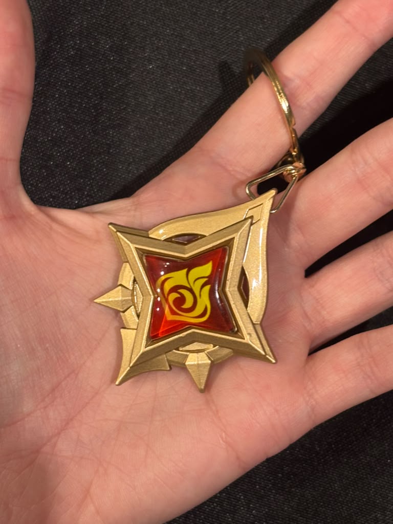 Genshin Impact - Pyro Stellar Linchpin Vision Metal Keychain