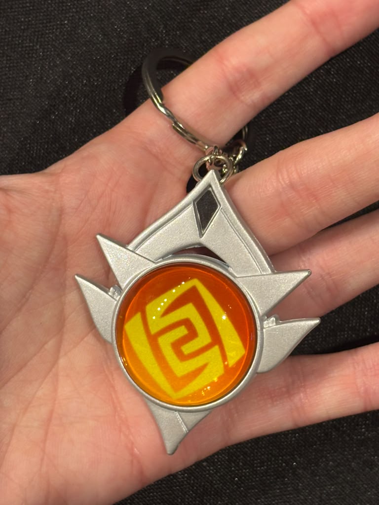 Genshin Impact - Geo Snezhnaya Vision Metal Keychain