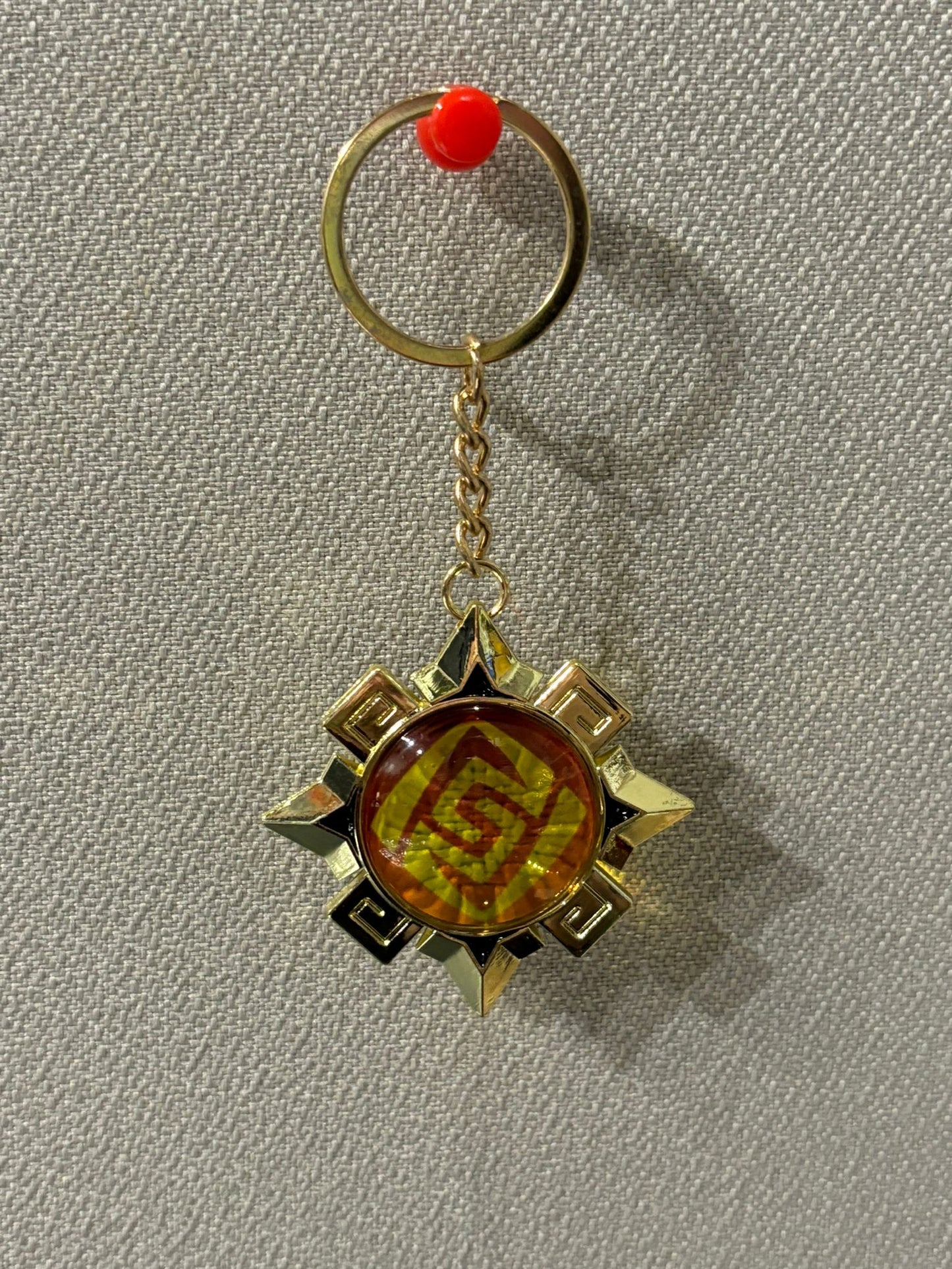 Genshin Impact - Geo Natlan Vision Metal Keychain