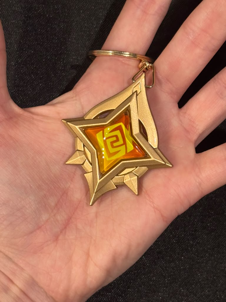 Genshin Impact -  Geo Stellar Linchpin Vision Metal Keychain